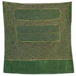 A GREEN GROUND SILK BANNER EMBROIDERED WITH SILVER AND GILT THREAD, EGYPT, 1343 AH/1924 AD