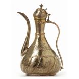 AN OTTOMAN GILT-COPPER (TOMBAK) EWER, TURKEY, 18TH CENTURY