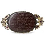 AN EXTREMELY RARE MUGHAL JADE AND INLAID PENDANT, BAZUBAND, 17TH CENTURY