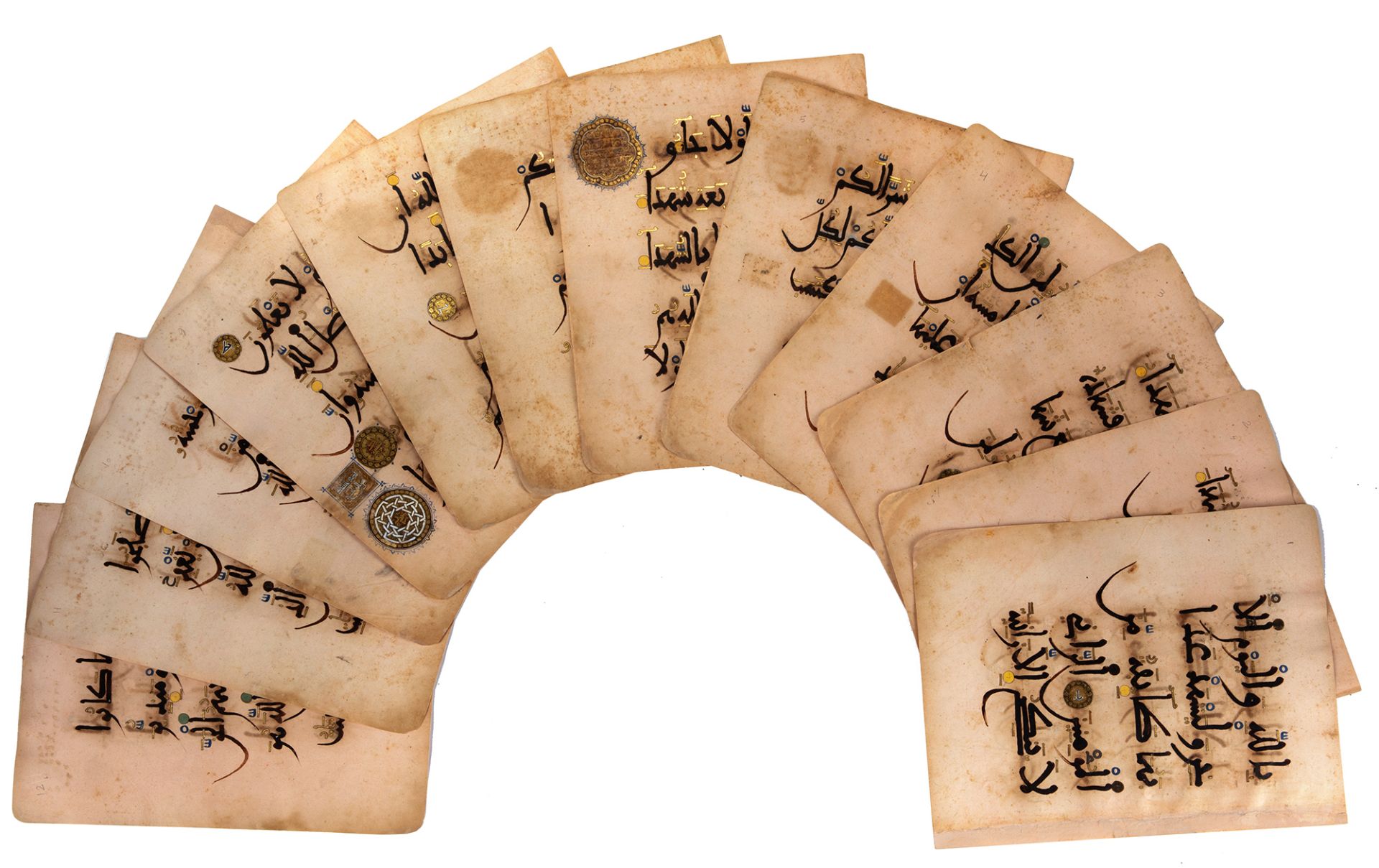 A RARE ANDALUSIAN QURAN SECTION ON PINK PAPER, ANDALUSIA, 13TH CENTURY