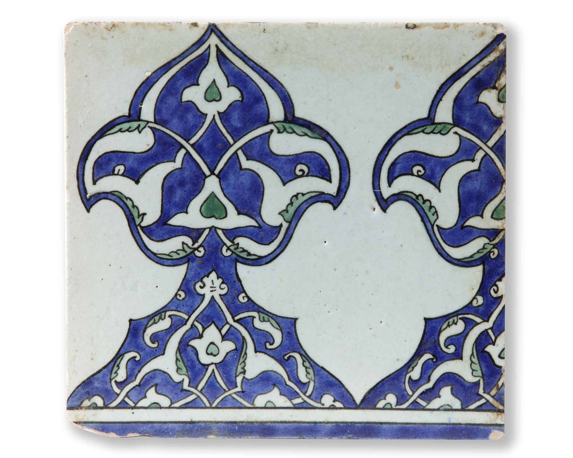 A PAIR OF DAMASCUS UNDERGLAZE PAINTED POTTERY BORDER TILES, SYRIA, 17TH CENTURY