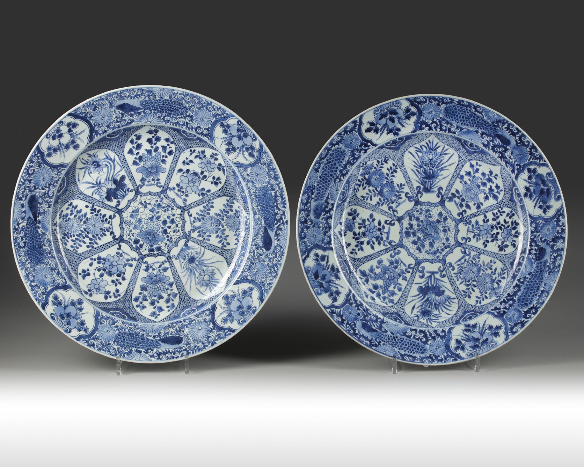 A PAIR OF LARGE CHINESE BLUE AND WHITE PEACOCK CHARGERS, KANGXI PERIOD (1662-1722)