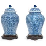 A LARGE PAIR OF CHINESE BLUE AND WHITE JARS AND COVERS, KANGXI PERIOD (1662-1722)