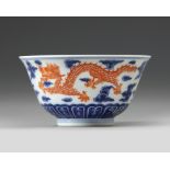 A CHINESE BLUE AND WHITE IRON-RED DECORATED 'DRAGON' BOWL, SIX-CHARACTER JIAQING MARK AND OF THE PER