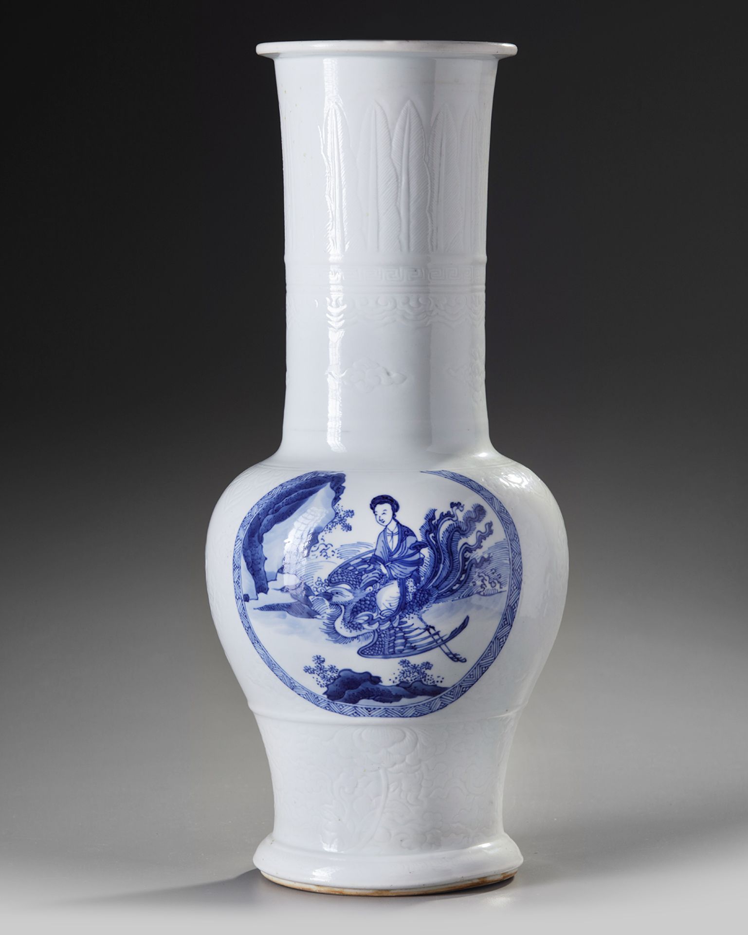 A CHINESE MOULDED WHITE-GROUND BLUE AND WHITE PHOENIX-TAIL VASE, KANGXI PERIOD (1662-1722)