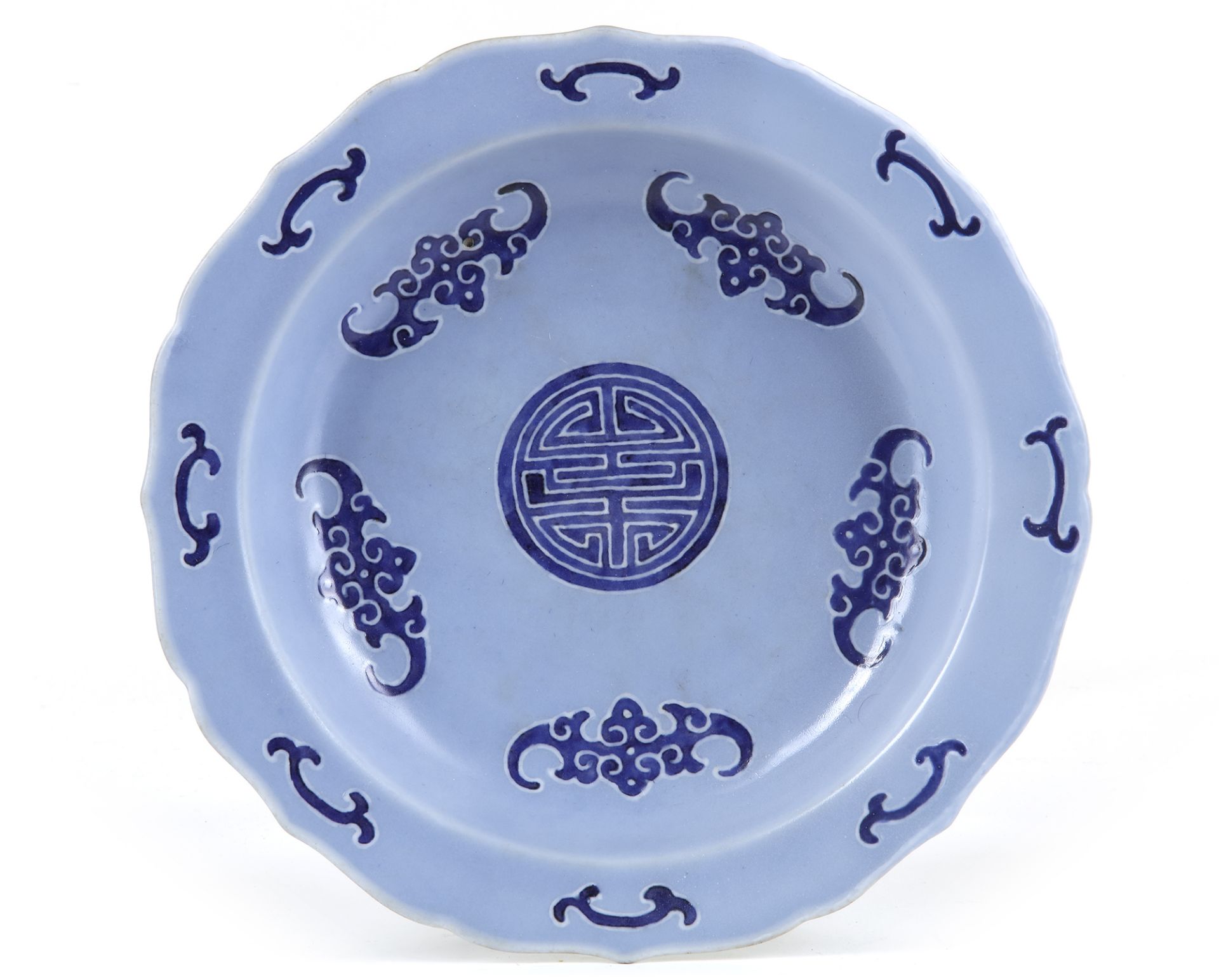 A CHINESE BLUE-GROUND SLIP DECORATED DISH, QIANLONG SIX-CHARACTER SEAL MARK IN UNDERGLAZE BLUE AND O