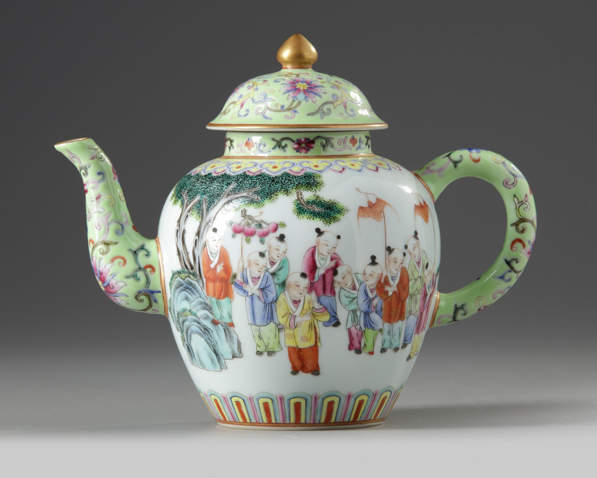 A CHINESE FAMILLE ROSE 'BOYS' TEAPOT AND COVER, 19TH-20TH CENTURY