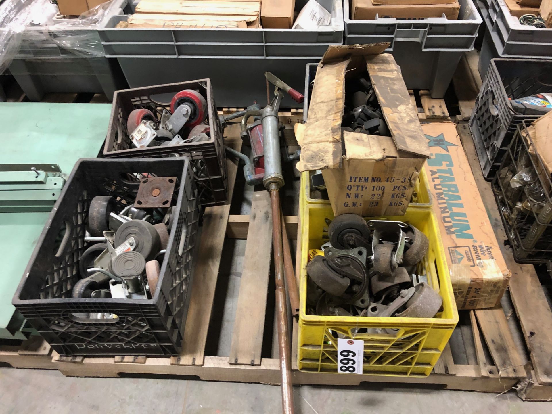 Pallet lot of Casters & barrel pumps