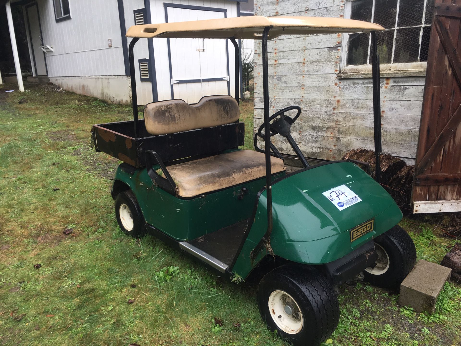EZ-Go Golf Cart (Includes 6 Trojan Batteries not known if operational)