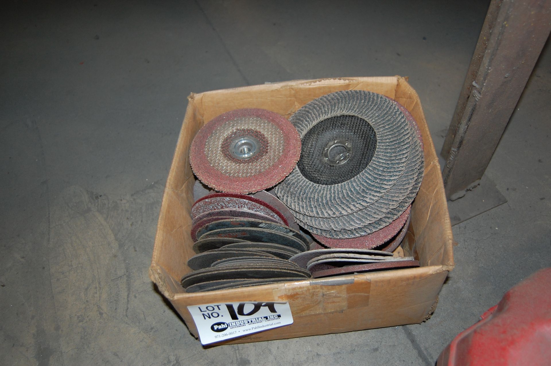 Box of assorted grinding wheels and discs