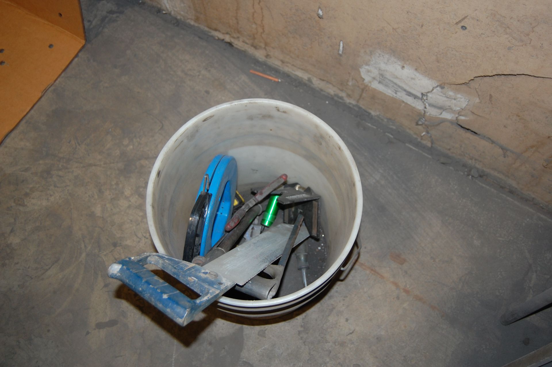 Bucket of assorted hand tools