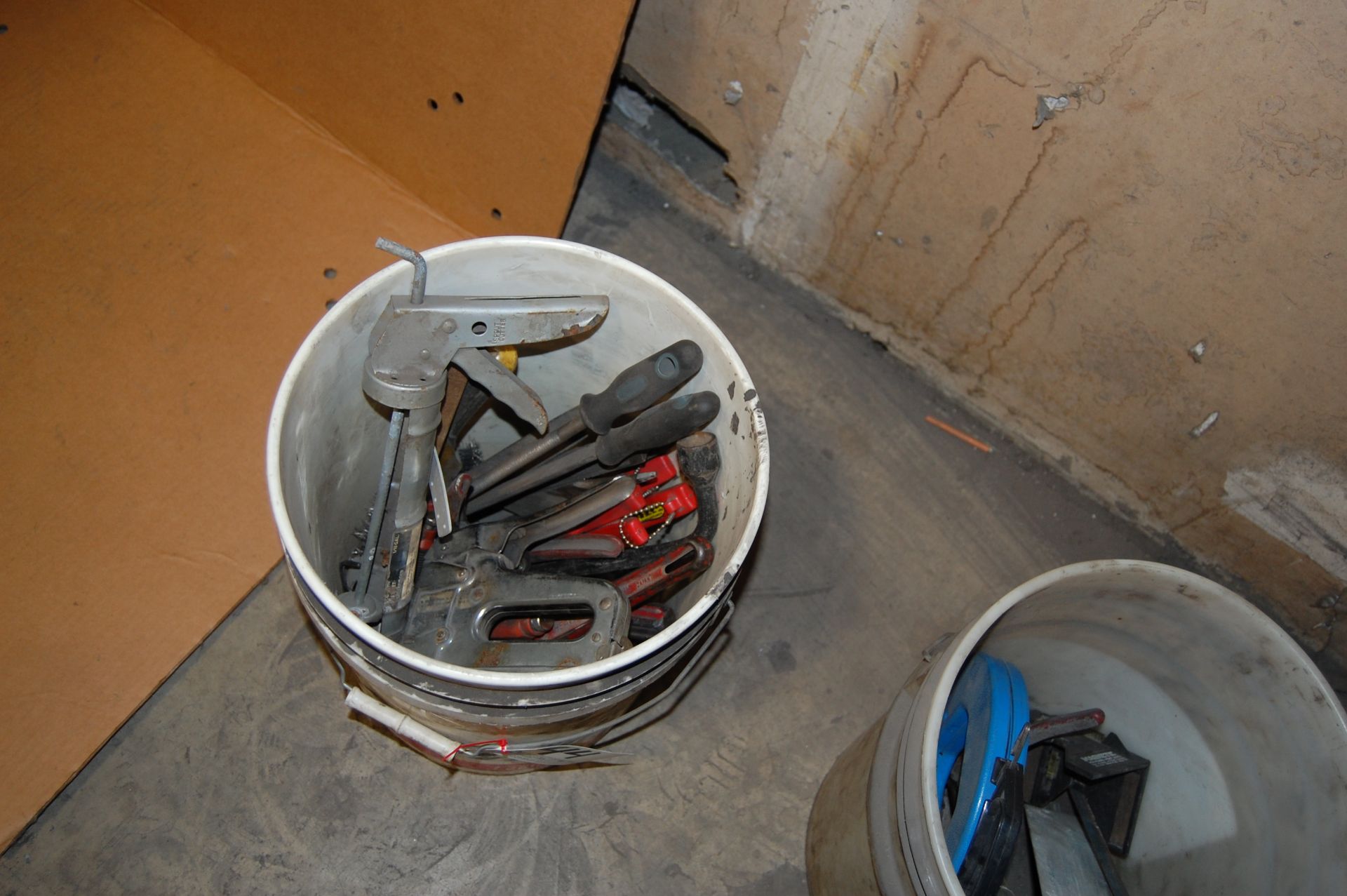 Bucket of assorted hand tools