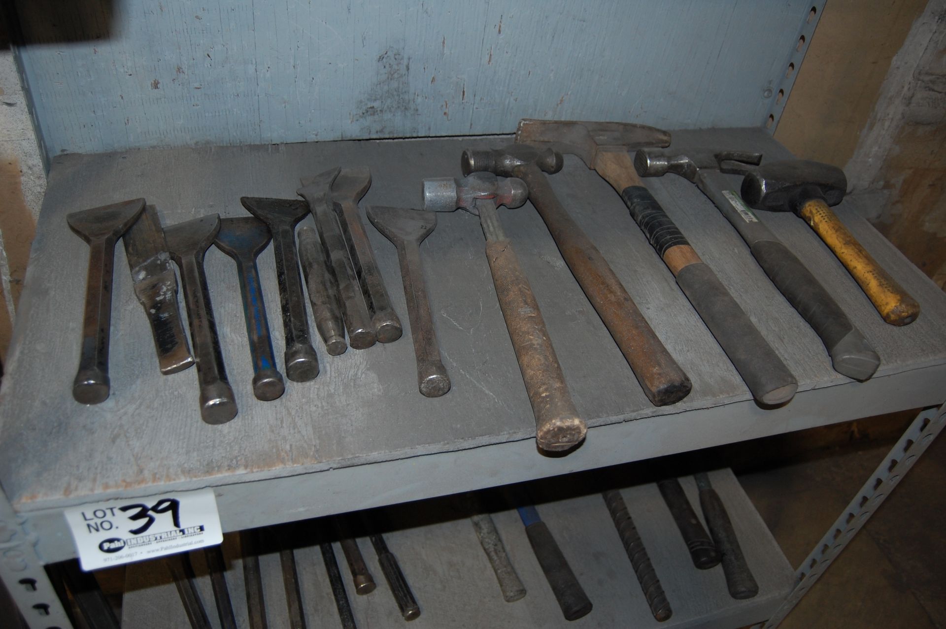 Assorted Hammers and Chisels on shelf