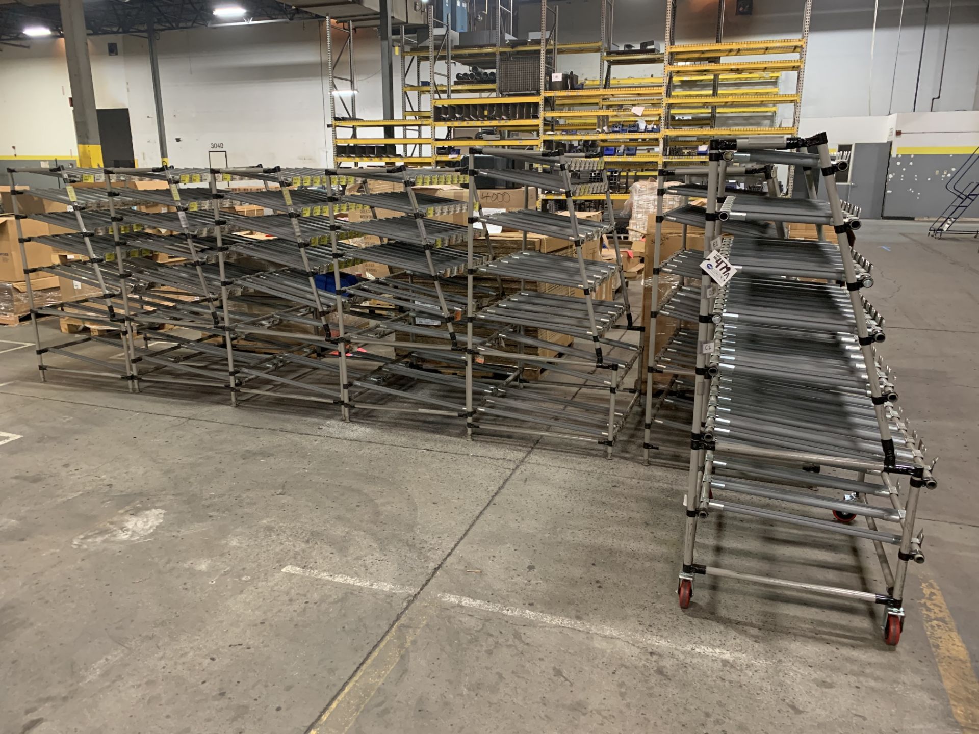 7 Shelving Units - 6 stationary, 1 on casters