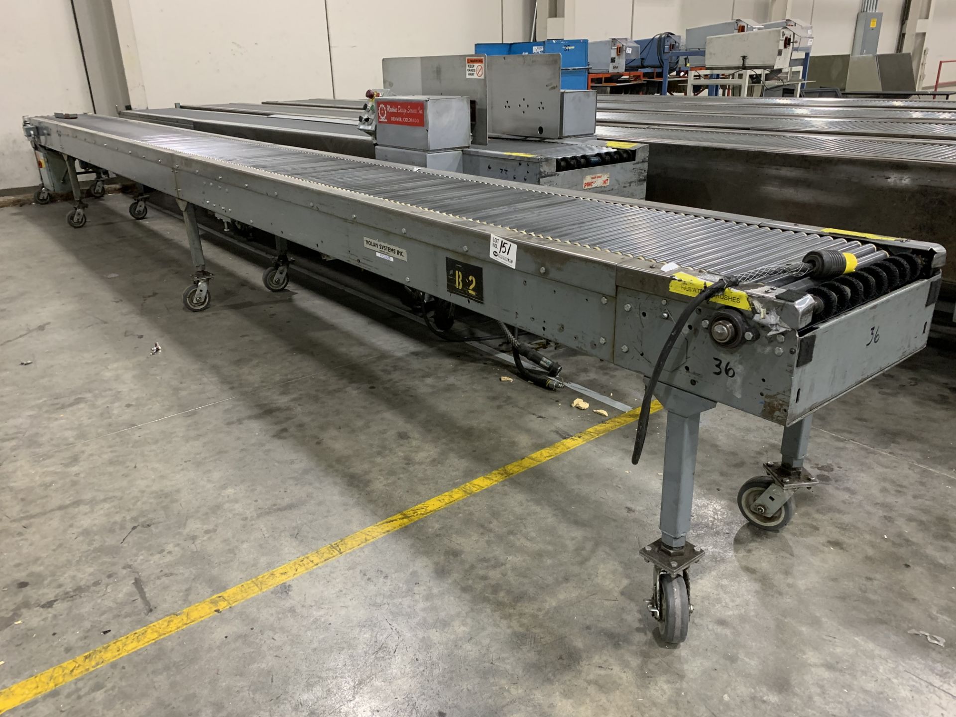 Nolan Systems Inc. 27' X 18" wide Conveyor