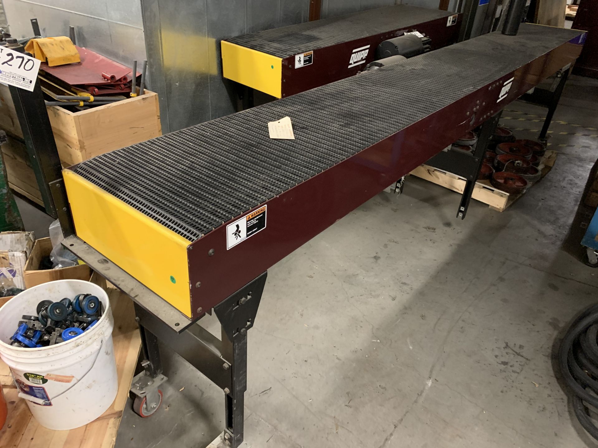 Unused Quipp 13' X 18" wide automated conveyor on casters