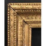 18th Century English School. A Carved Giltwood Frame, 55.25" x 46.5" (140.3 x 118.1cm) (rebate).