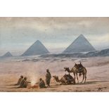 Edwin Lord Weeks (1849-1903) British. Arabs and their Camels by the Fireside, with the Pyramids in