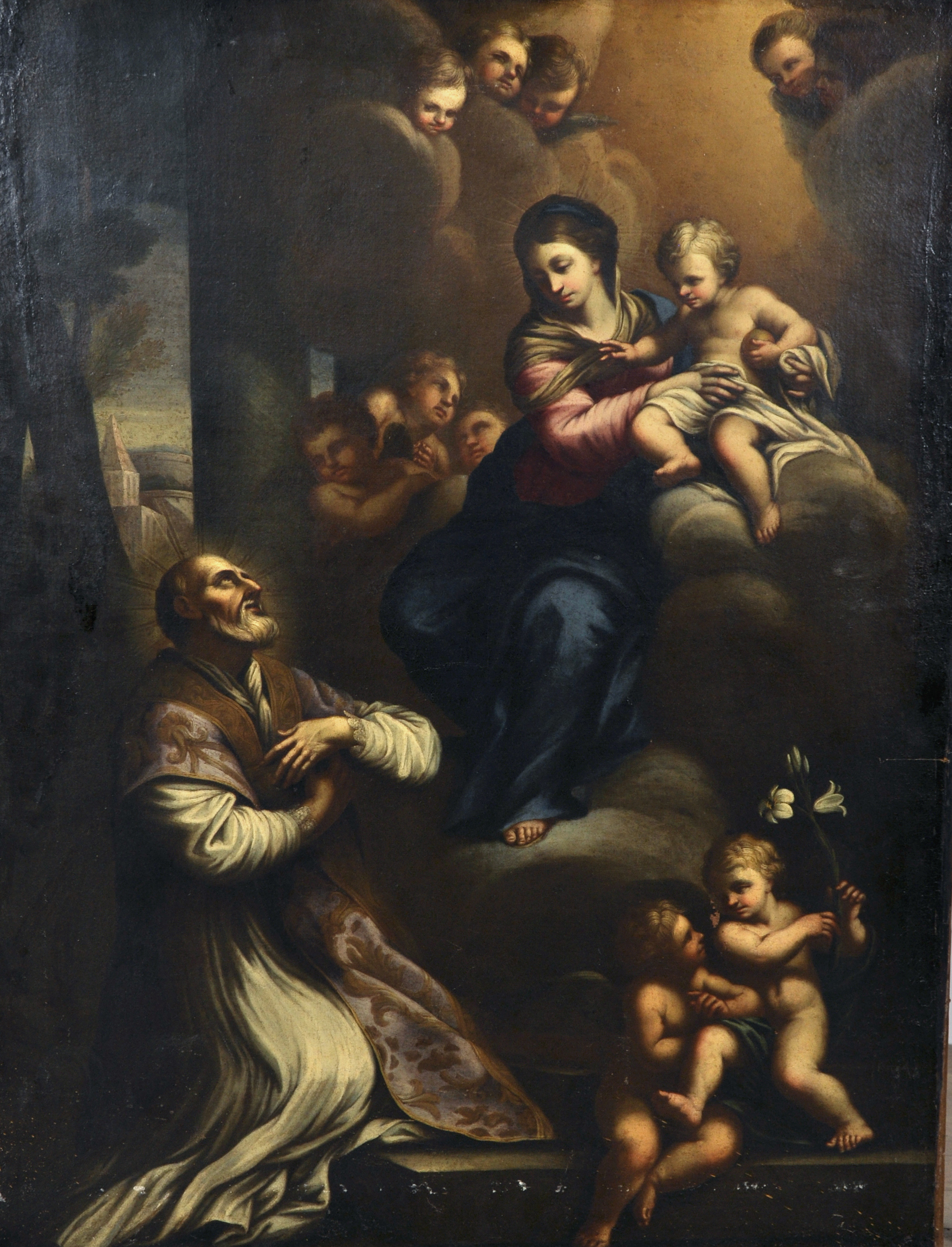 17th Century Spanish School. Saint Joseph with the Mother and Child Surrounded by Angels, Oil on