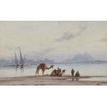 Edwin Lord Weeks (1849-1903) British. A Scene on the Nile with Arabs and Camels in the foreground,