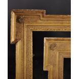 18th Century English School. A Broken Corner Carved Giltwood Frame, with corner rosettes, rebate 34”