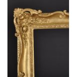 20th Century English School. A Gilt Composition Frame, with swept and pierced centres and corners,