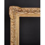 20th Century English School. A Gilt Composition Frame, with swept centres and corners, rebate 24”