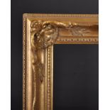 20th Century English School. A Gilt Composition Frame, with swept and pierced centres and corners,