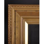 19th Century English School. A Gilt Composition Plate Frame, with inset glass, rebate 24” x 13.5” (