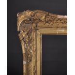 19th Century English School. A Gilt Composition Frame, with Swept Centres and Corners, rebate 26”