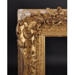 Early 19th Century English School. A Gilt Composition Frame, with swept centres and corners,