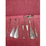 Collection of silver handled shoe horn, button hook, together with manicure items etc.