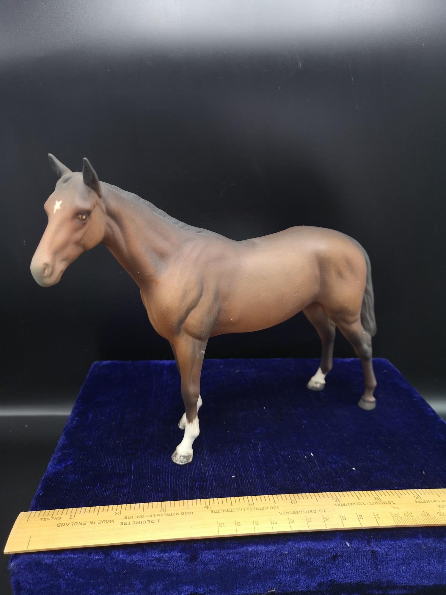 Beswick racing brown stallion horse figure.