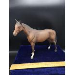 Beswick racing brown stallion horse figure.