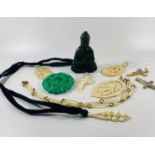 Selection of necklace & pendants, mother of pearl, jade & bakelite.