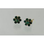 Pair of vintage 9ct gold earrings set in green stone possibly emerald.