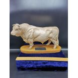 Beswick Charolais bull support on a wooden plinth.