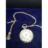 Ladies silver pocket watch with albertina chain.