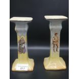 Pair of royal doulton shylock and Orlando candle sticks.