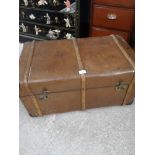 Stunning 19th century leather trunk with wooden bounding.
