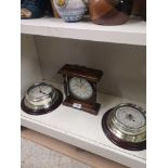 2 clocks together with barometer.