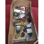 Box of interesting items to include scottish paperweight, medals etc.