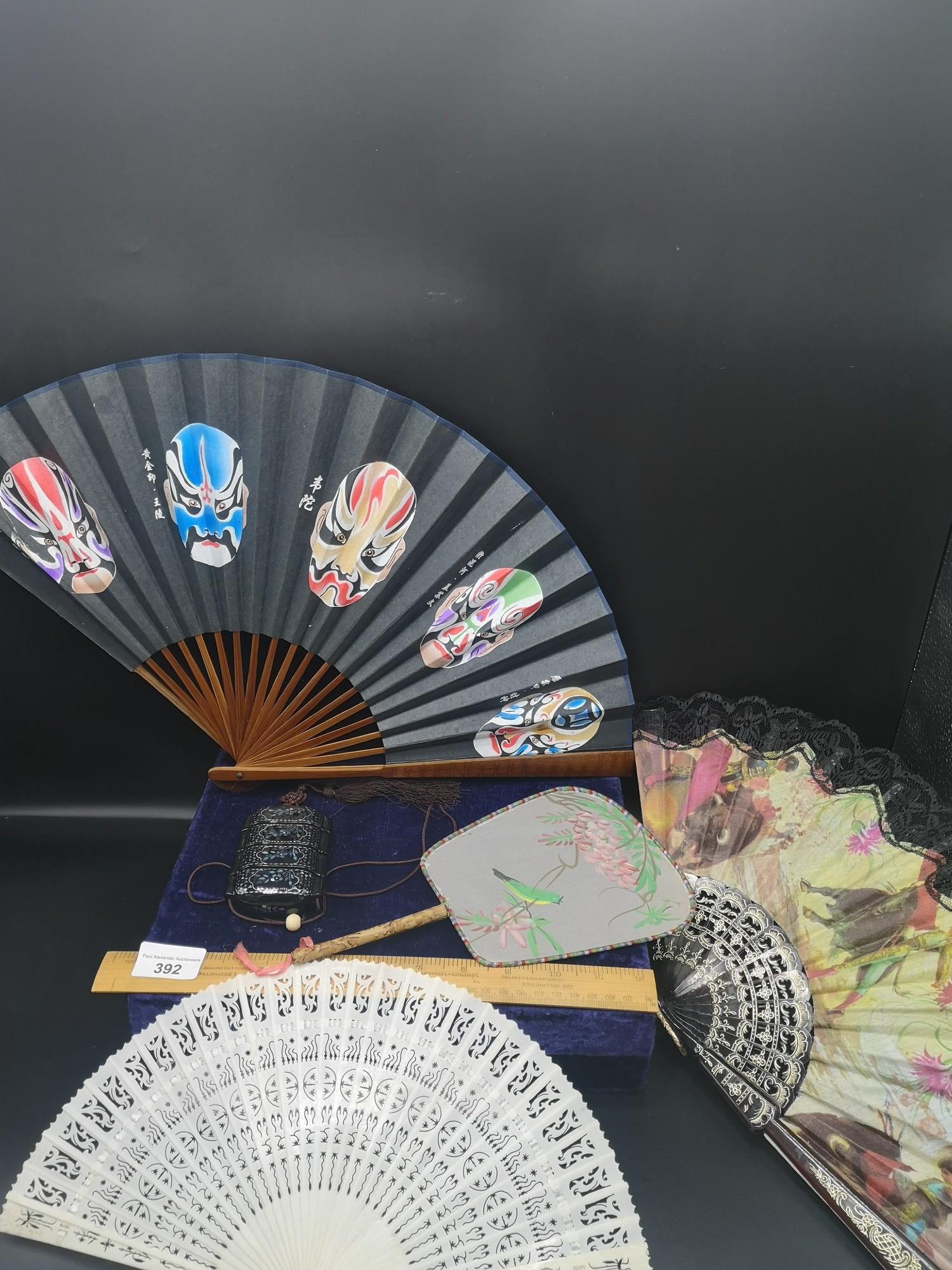 Lot of vintage fans together with Chinese mother pearl style inrow.