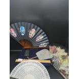 Lot of vintage fans together with Chinese mother pearl style inrow.