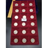 Collection of 18 collectable two pound coins.
