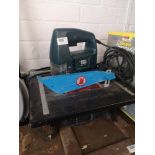 Table saw together with jigsaw power tool.