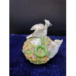 Early Staffordshire bird and snake figure.
