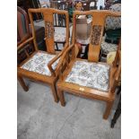Pair of Oriental rose wood arm chairs in stunning condition..