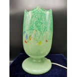 Monart scottish glass table lamp with green colouration and mulit swirl colourations.