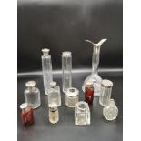 Collection of silver topped bottles etc.